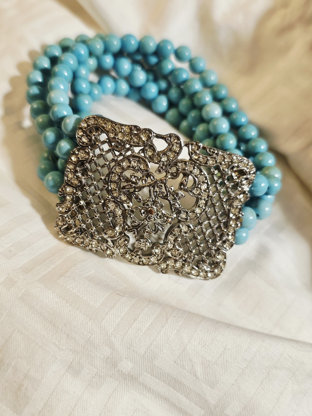 Multi-Strand Vibrant Turquoise-Colored Bracelet Rhinestone Filigree Center
